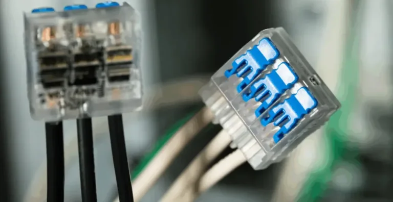 Close-up of cable connectors in server room.