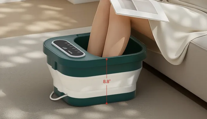Portable foot spa bath with legs immersed.
